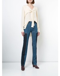 Темно-синие джинсы-клеш от Chloé