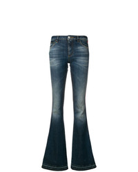 Темно-синие джинсы-клеш от Philipp Plein