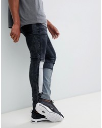 Темно-синие зауженные джинсы в стиле пэчворк