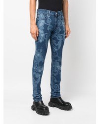 Мужские темно-синие зауженные джинсы с принтом от Versace