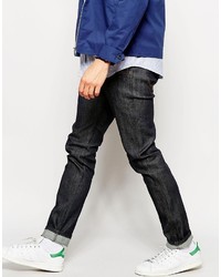 Мужские темно-синие зауженные джинсы от Wrangler