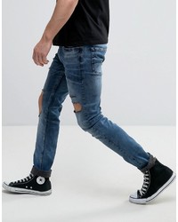 Мужские темно-синие зауженные джинсы от Religion