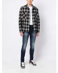 Мужские темно-синие зауженные джинсы от True Religion