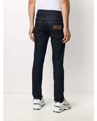 Мужские темно-синие зауженные джинсы от VERSACE JEANS COUTURE