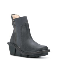 Темно-синие кожаные ботильоны на танкетке от Trippen