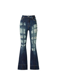 Темно-синие рваные джинсы-клеш от Amapô