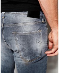 Мужские темно-синие рваные джинсы от True Religion