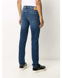 Мужские темно-синие рваные джинсы от Diesel