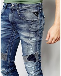 Мужские темно-синие рваные джинсы от Replay