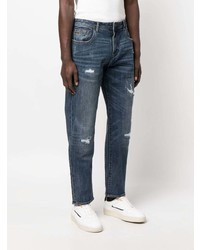 Мужские темно-синие рваные джинсы от Armani Exchange