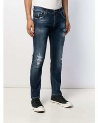 Мужские темно-синие рваные джинсы от Dondup