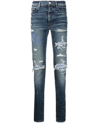Мужские темно-синие рваные зауженные джинсы от Amiri