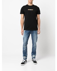 Мужские темно-синие рваные зауженные джинсы от Ksubi