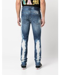 Мужские темно-синие рваные зауженные джинсы от Ksubi