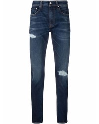 Мужские темно-синие рваные зауженные джинсы от Calvin Klein Jeans