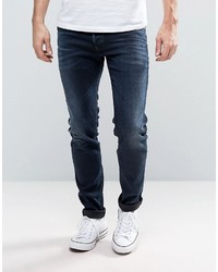 Мужские темно-синие рваные зауженные джинсы от Diesel