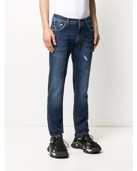 Мужские темно-синие рваные зауженные джинсы от Dolce & Gabbana