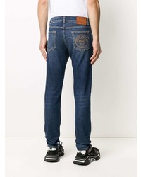 Мужские темно-синие рваные зауженные джинсы от Dolce & Gabbana