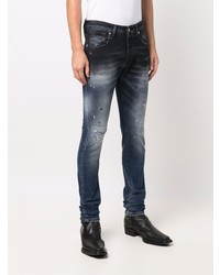 Мужские темно-синие рваные зауженные джинсы от John Richmond