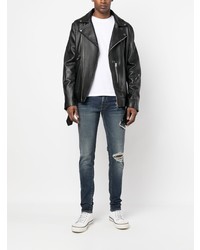 Мужские темно-синие рваные зауженные джинсы от Amiri