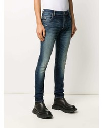 Мужские темно-синие рваные зауженные джинсы от Balmain