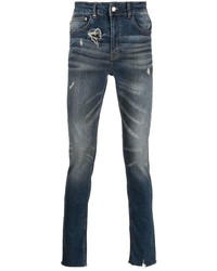 Мужские темно-синие рваные зауженные джинсы от Flaneur Homme