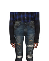 Мужские темно-синие рваные зауженные джинсы от Amiri
