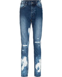 Мужские темно-синие рваные зауженные джинсы от Ksubi