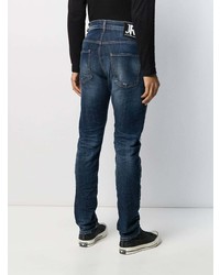 Мужские темно-синие рваные зауженные джинсы от John Richmond