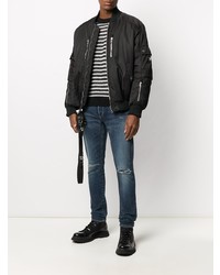 Мужские темно-синие рваные зауженные джинсы от Balmain