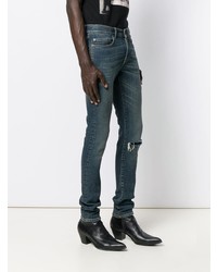 Мужские темно-синие рваные зауженные джинсы от Saint Laurent