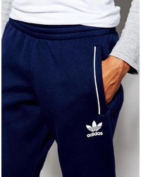 Мужские темно-синие спортивные штаны с принтом от adidas
