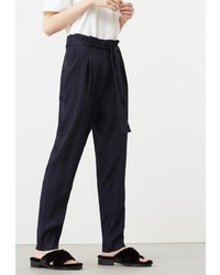 Темно-синие узкие брюки от Mango