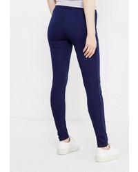 Темно-синие узкие брюки от Modis