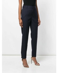 Темно-синие узкие брюки от Saint Laurent
