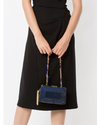 Темно-синий клатч с украшением от Serpui