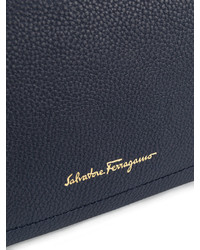 Темно-синий клатч от Salvatore Ferragamo