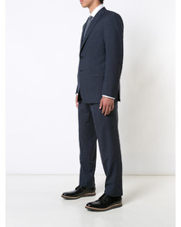 Темно-синий костюм от Brioni