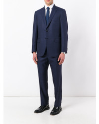 Темно-синий костюм от Brioni