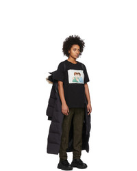 Женский темно-синий пуховик от Canada Goose