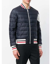 Мужской темно-синий стеганый бомбер от Moncler