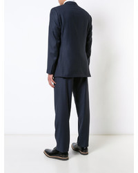 Темно-синий шерстяной костюм от Brioni