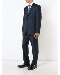Темно-синий шерстяной костюм от Brioni