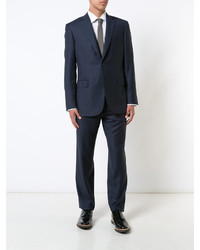 Темно-синий шерстяной костюм от Brioni