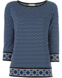 Темно-синяя блузка с геометрическим рисунком