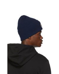 Мужская темно-синяя вязаная шапка от Moncler