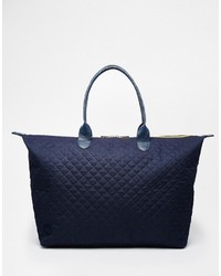 Женская темно-синяя замшевая стеганая сумка от Mi-pac