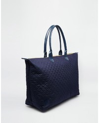 Женская темно-синяя замшевая стеганая сумка от Mi-pac