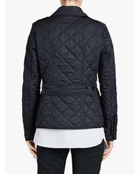 Женская темно-синяя куртка-пуховик от Burberry