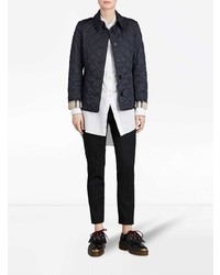 Женская темно-синяя куртка-пуховик от Burberry